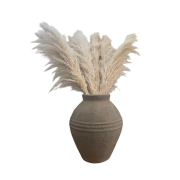 Natural vases and planters for warm interior spaces by Cabana Miami