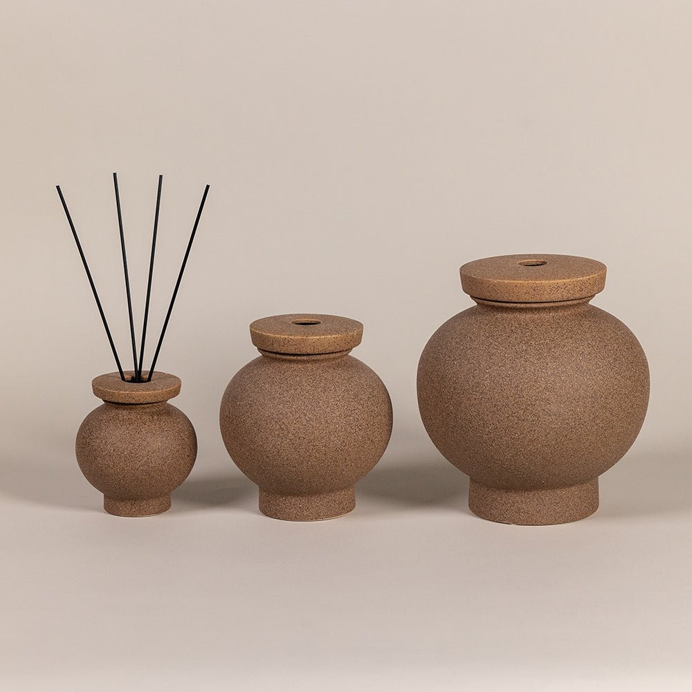 Stone-inspired diffusers with warm Sonora desert tone