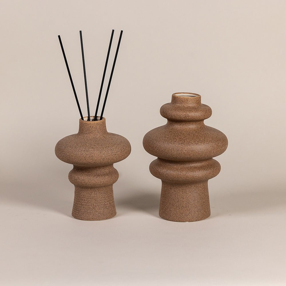 Reed diffusers with wave-inspired sculptural form
