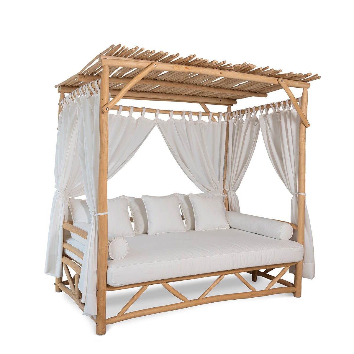 Crusoe Daybed with plush cushions and natural frame
