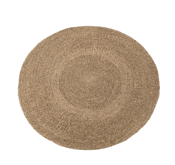 Round seagrass rug with braided border and subtle fringe