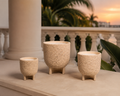 Alexandria Cup Candles on a shaded Miami veranda