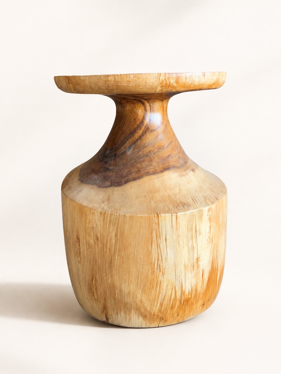 Alura Side Table natural Suar wood in a clean luxury catalog setting