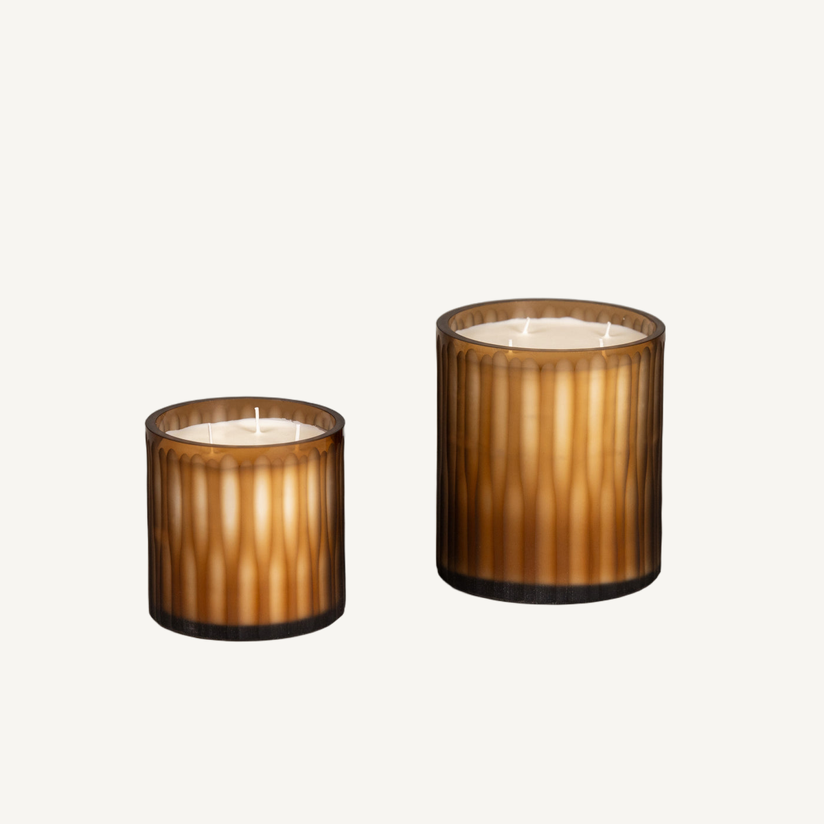 amber kim cylinder candles main on Cabana off-white background