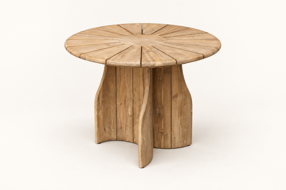 Bajo Round Dining Table three-quarter catalog view