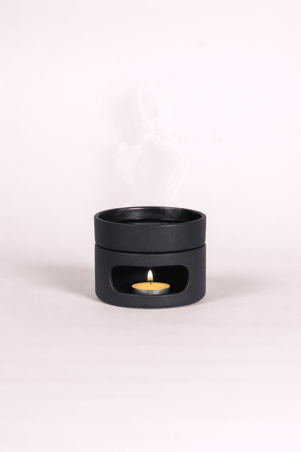 Oil burner set with sculptural decorative form