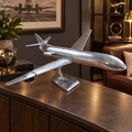 Boeing polished aluminum aircraft sculpture in an aviation-inspired office