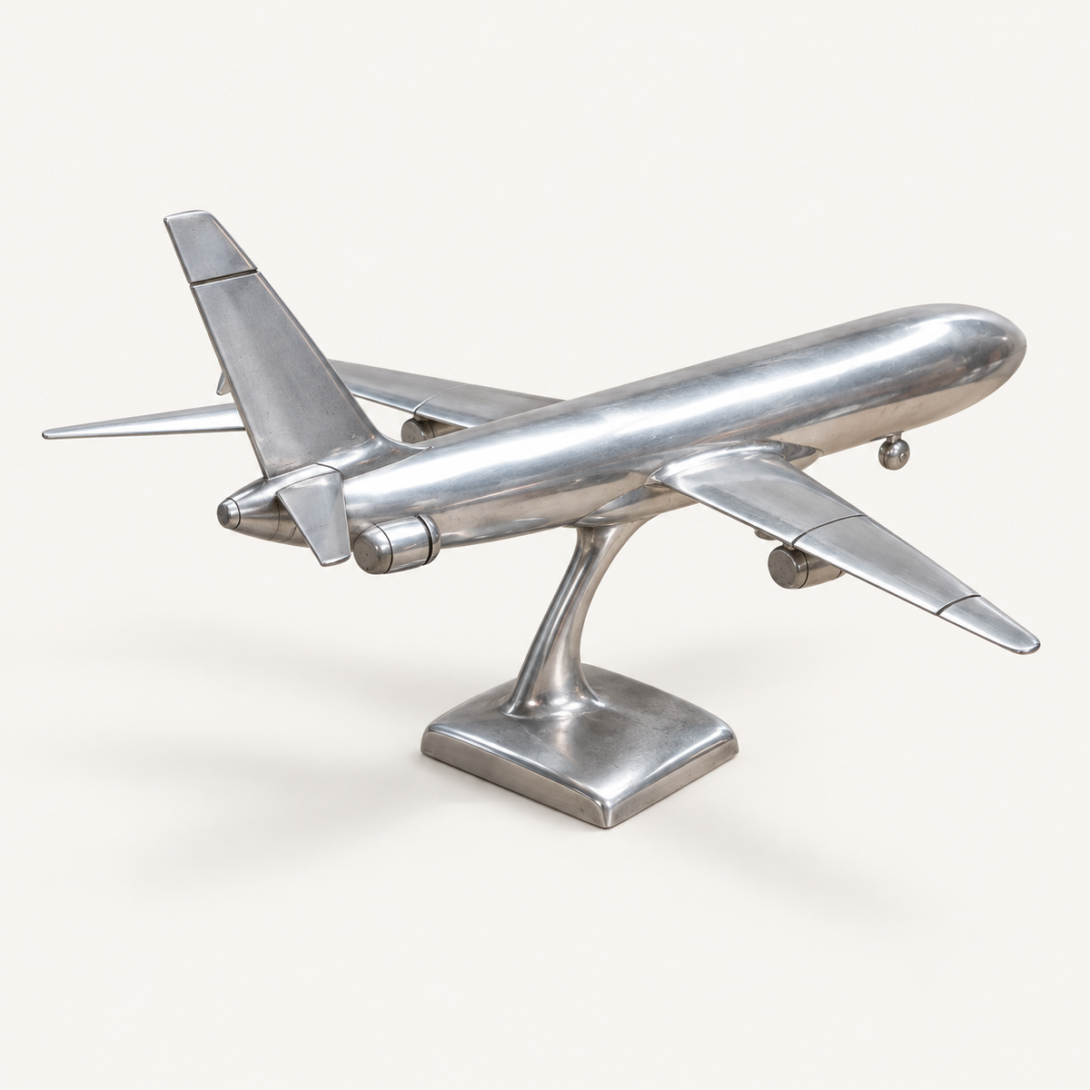 Boeing polished aluminum aircraft sculpture, rear three-quarter view