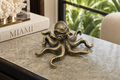 Antique Bronze Octopus Sculpture in a luxury interior