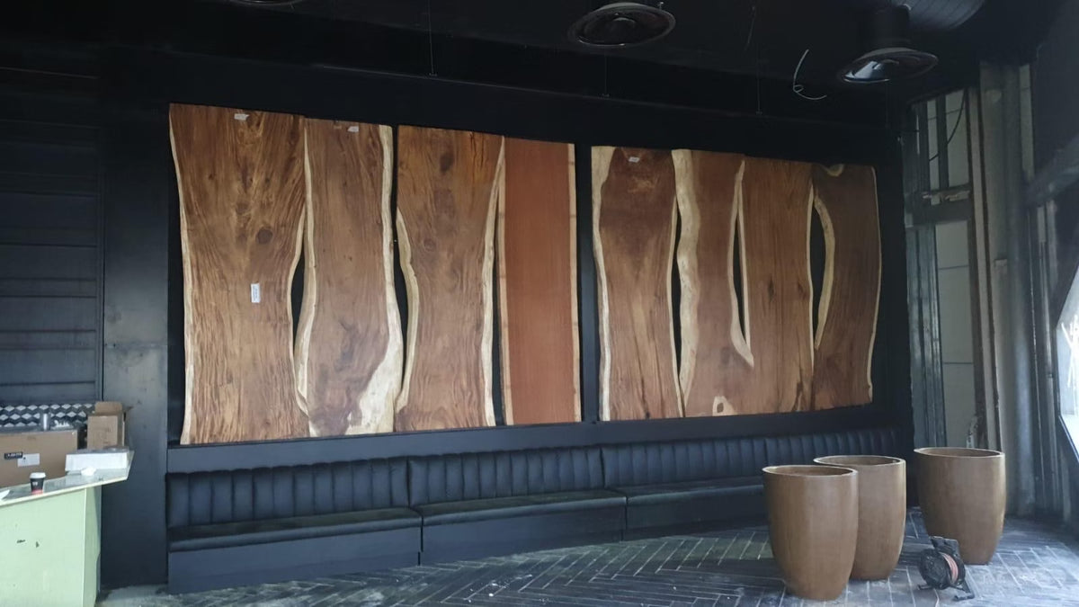 Custom live edge wood installation at Ruben Restaurant