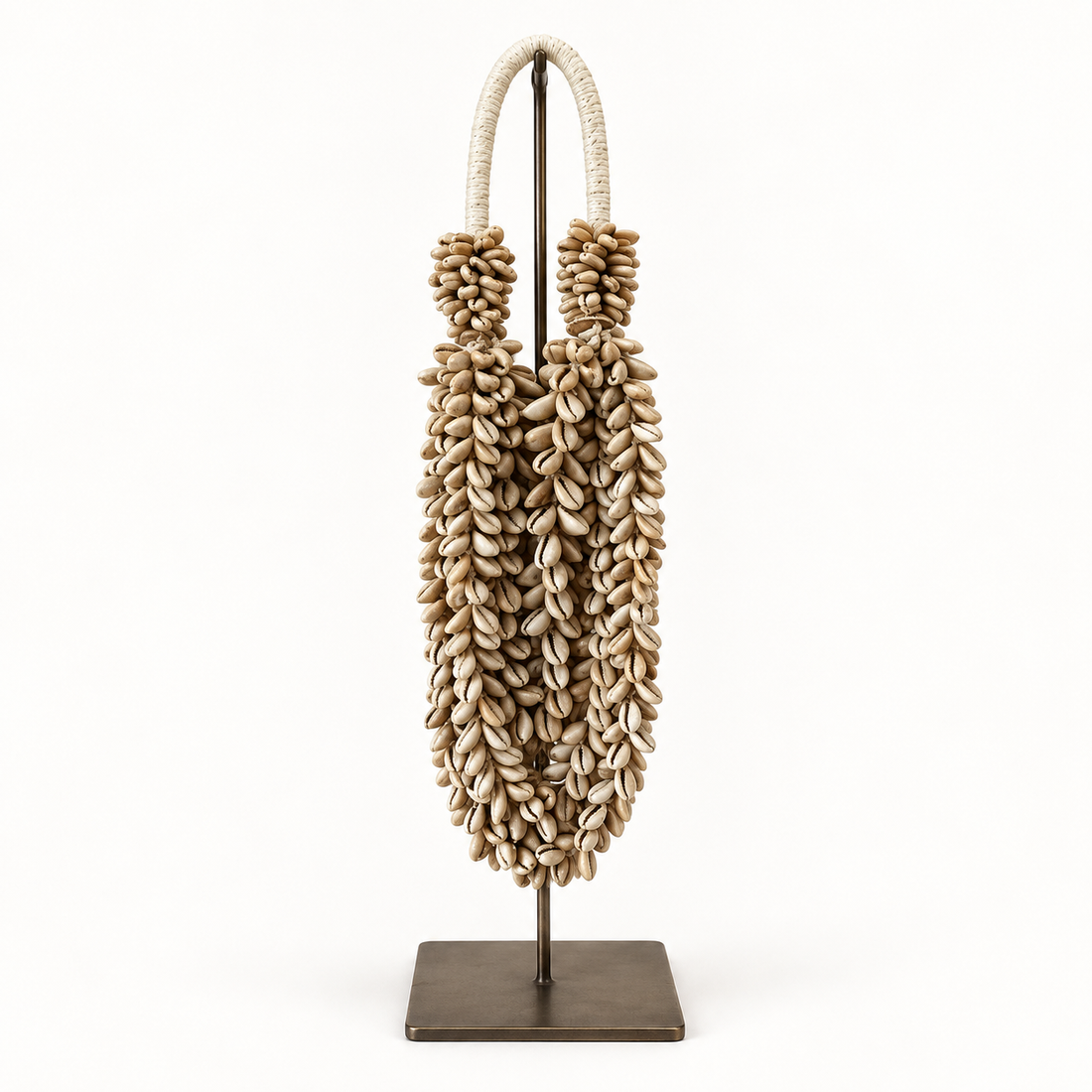 Cowrie decorative shell necklace — Cowrie shell necklace on metal stand, front catalog view