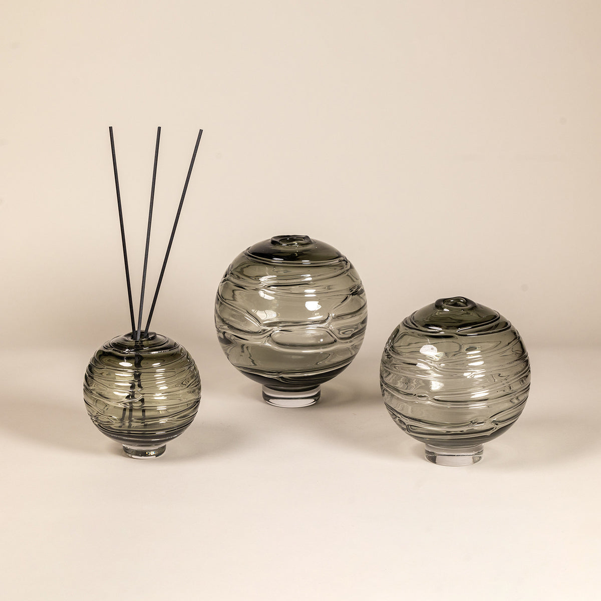 Glass diffusers with spiral sculptural design