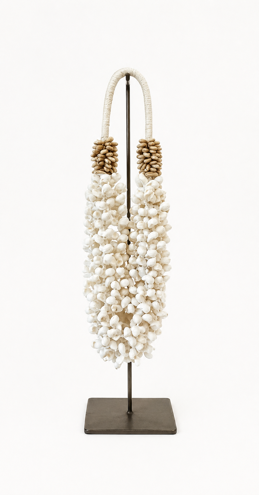 Buteng decorative shell necklace — Buteng shell necklace on metal stand catalog view