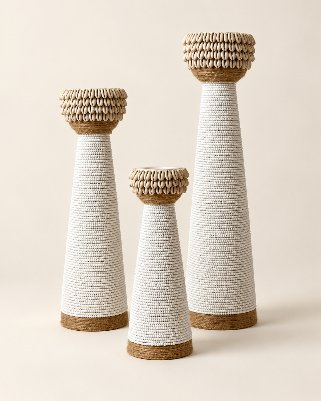 White shell-trim candle holders in three sizes, front view