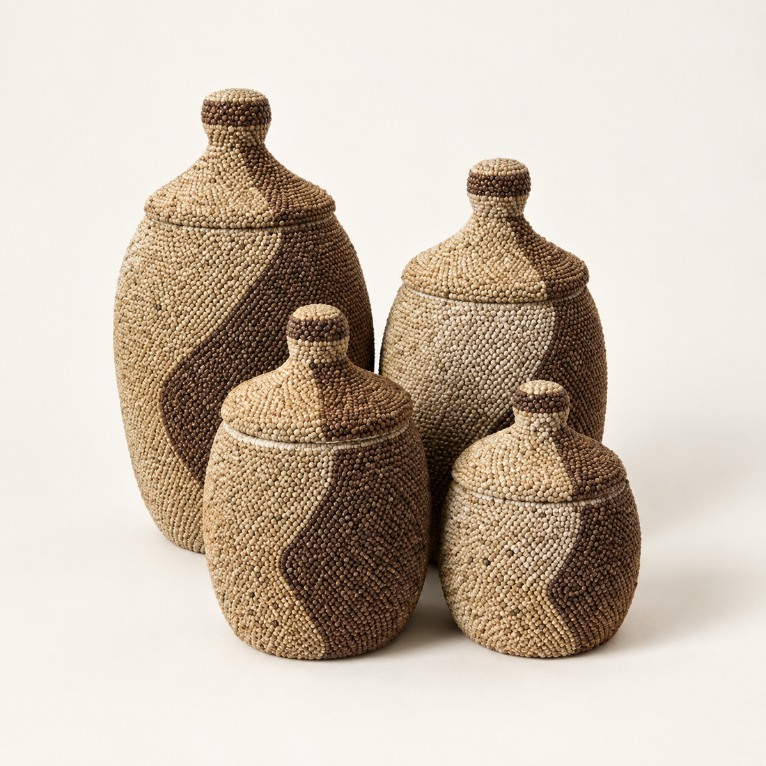 Natural handwoven lidded vessel set of four — front catalog view