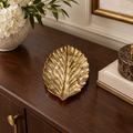 Antique Gold Serrated Leaf decorative tray in a luxury dining room