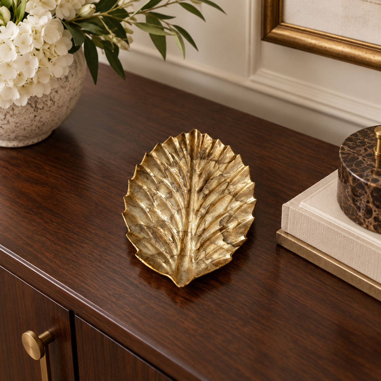 Antique Gold Serrated Leaf decorative tray in a luxury dining room