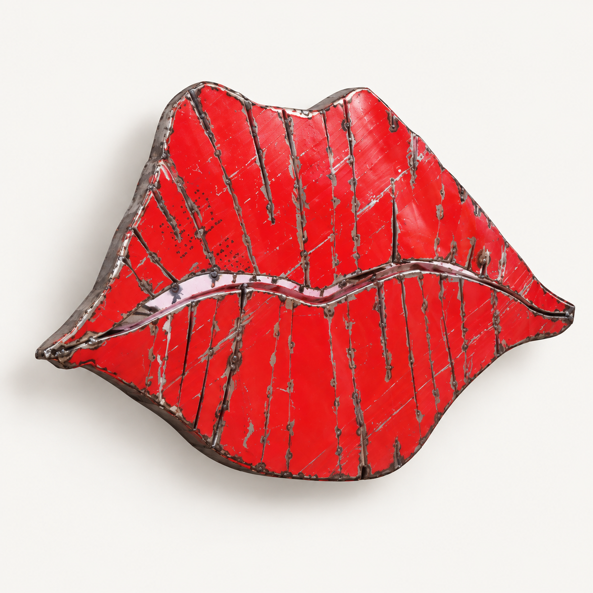 Recycled metal barrel Lips wall sculpture, angled view