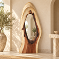 Monumental Suar Wood Mirror styled in a warm neutral interior