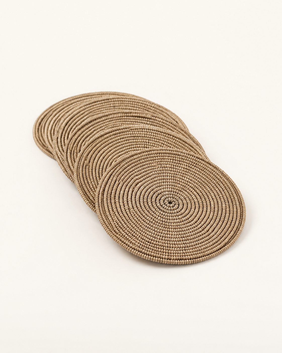 Natural beaded coaster set, angled catalog view