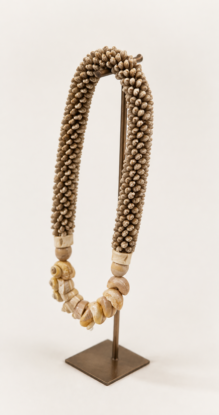 Natural Cowrie Statement decorative shell necklace — Natural Cowrie Statement Necklace on Metal Stand catalog view