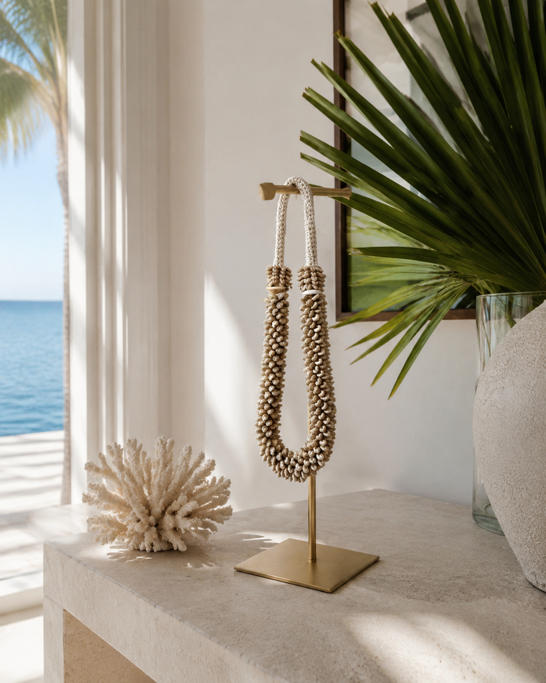 Natural Double Strand Shell Necklace on Metal Stand, styled interior