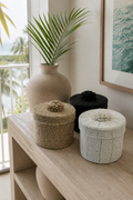 Natural handwoven beaded basket set in a refined interior