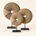 Natural Shell donut sculptures in S, M and L on included black metal stands