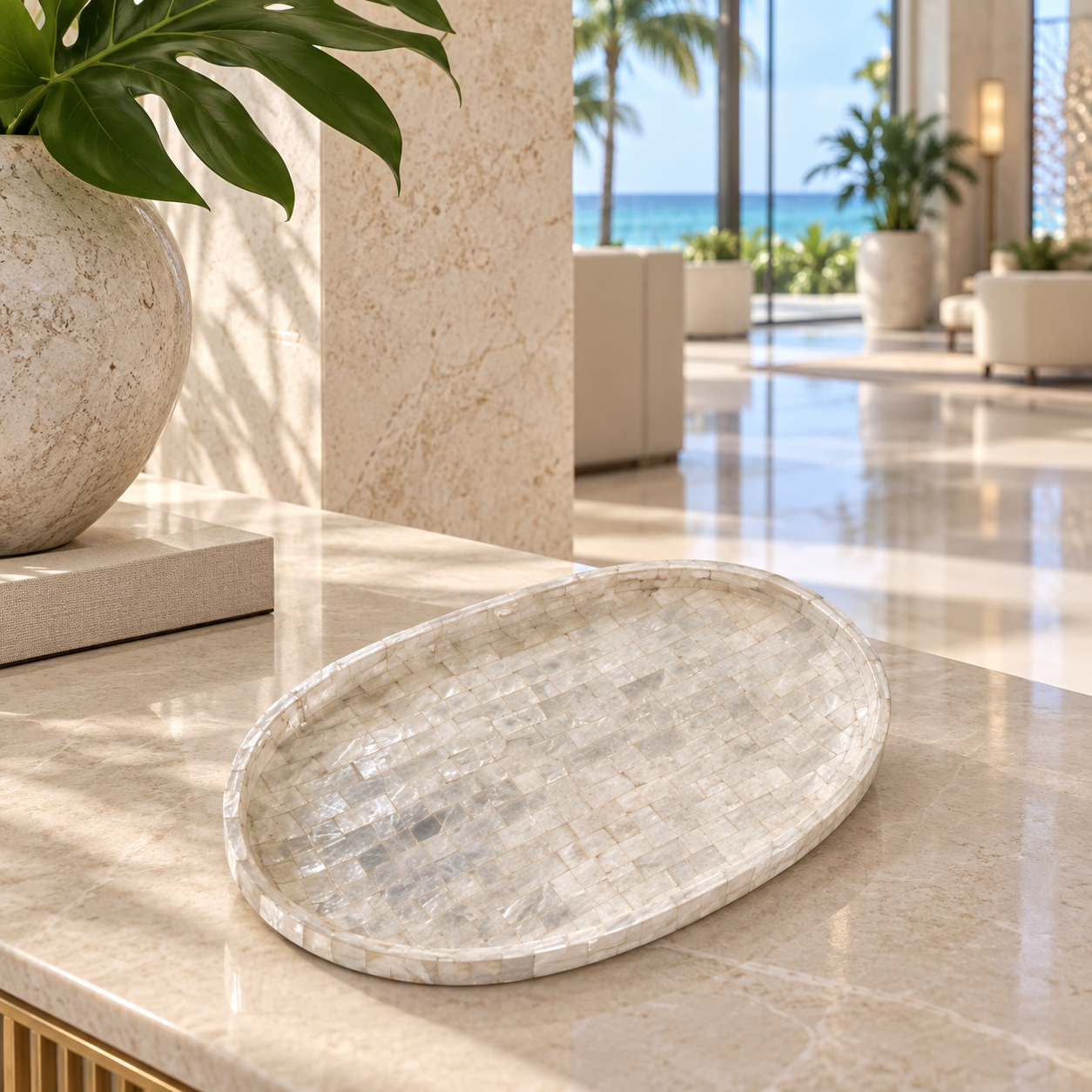 White Mosaic oval shell decorative tray in a luxury Miami hotel lobby