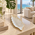 Pearlescent resin leaf decorative tray in a luxury Miami hotel suite