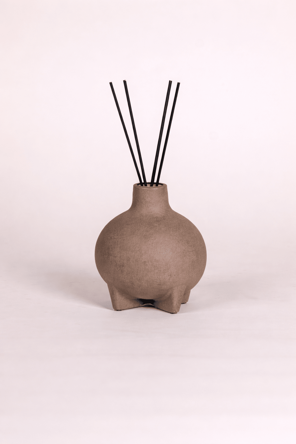 Petra Reed Diffusers styled on a natural bathroom vanity