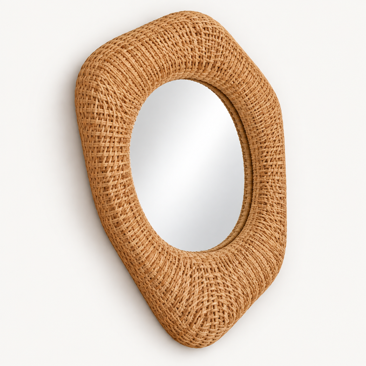 Organic Rattan Teardrop Mirror, angled view