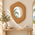 Organic Rattan Teardrop Mirror styled in a warm neutral interior