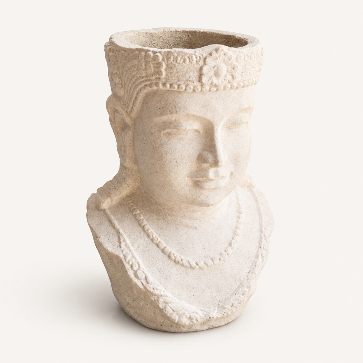 Sandstone Buddha Head Planter front three-quarter view