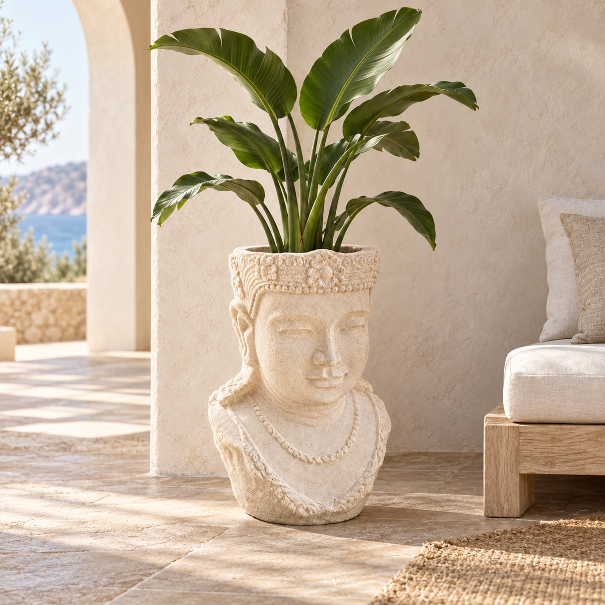 Sandstone Buddha Head Planter in a warm coastal interior