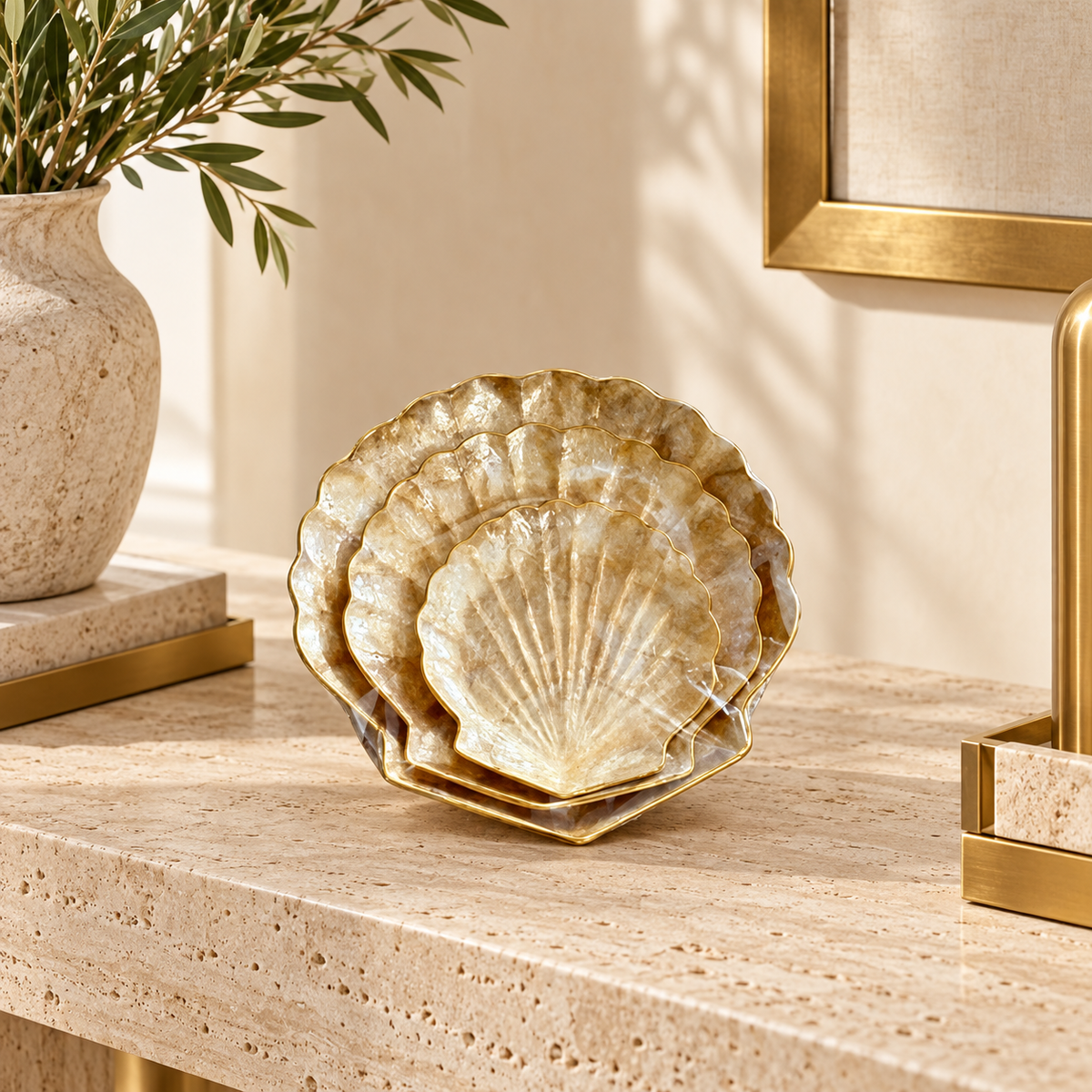 Antique Gold Scallop shell bowl trio in a luxury hotel lobby