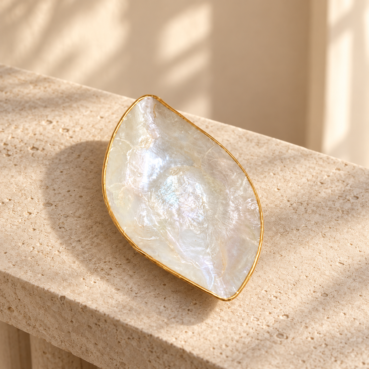 Shell Leaf Bowl styled on a pale limestone console