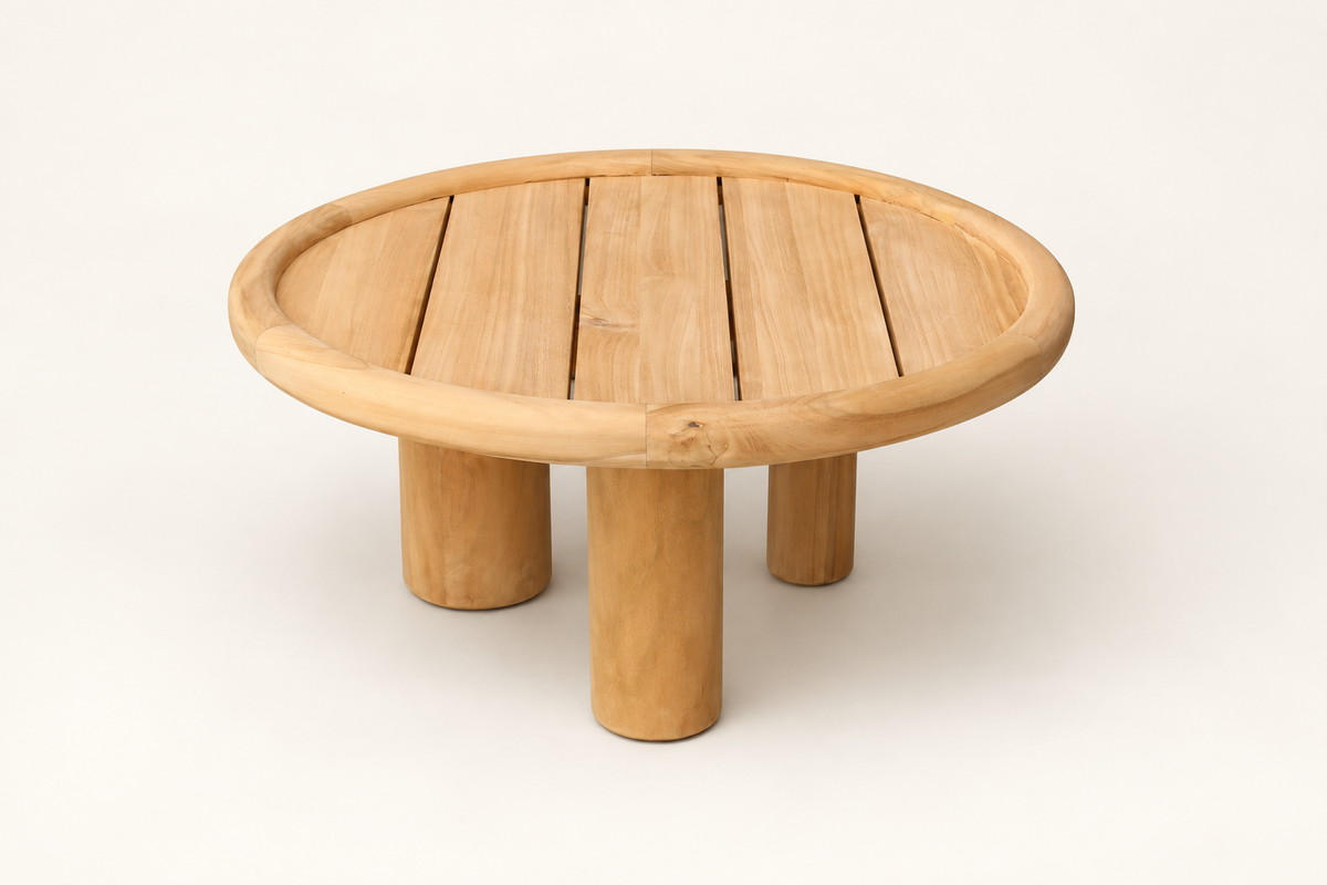 Shiraz round teak coffee table on a clean background