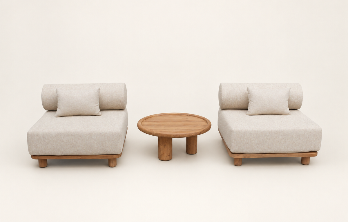 Two Shiraz lounge chairs and round coffee table on a clean background