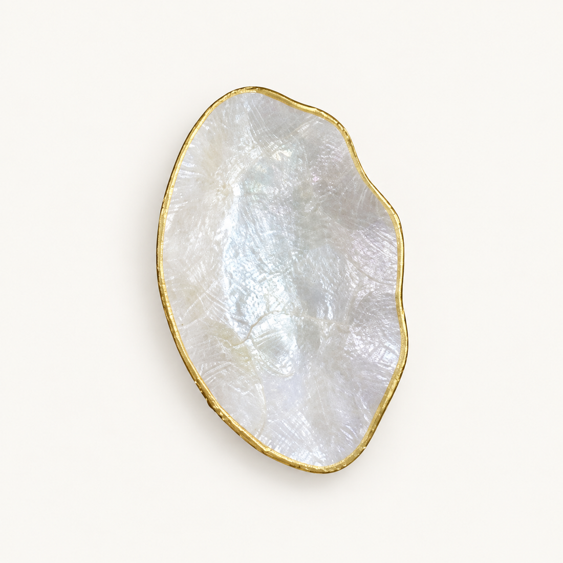 Small Shell Leaf Decorative Bowl on warm cream catalog background