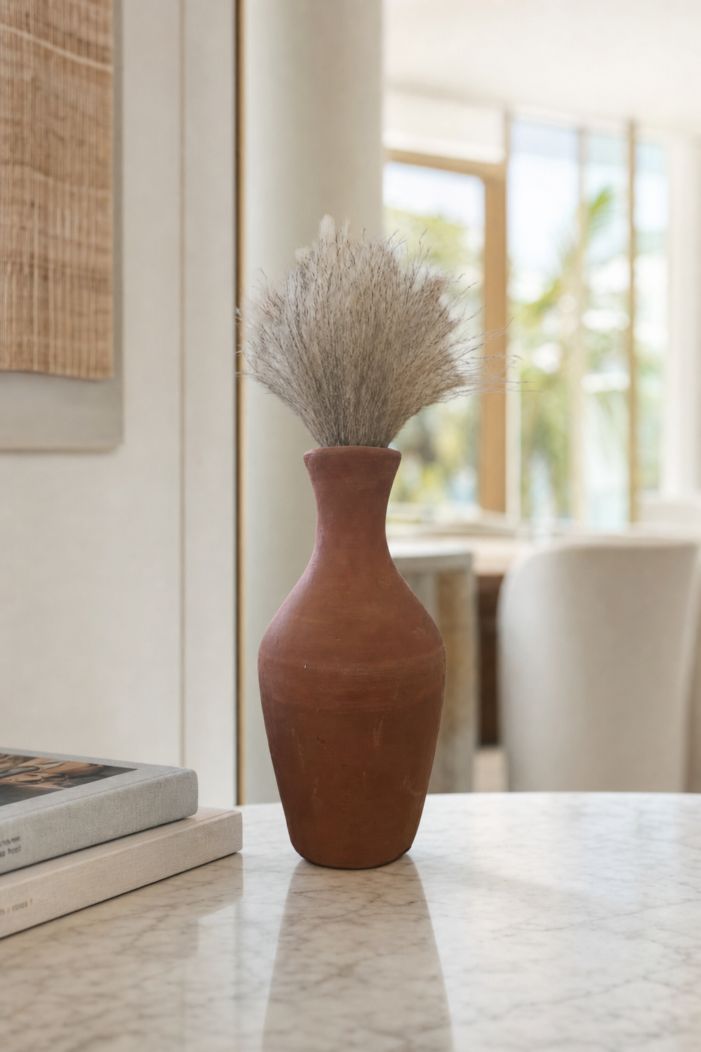 Sol Clay Bud Vase styled in an interior