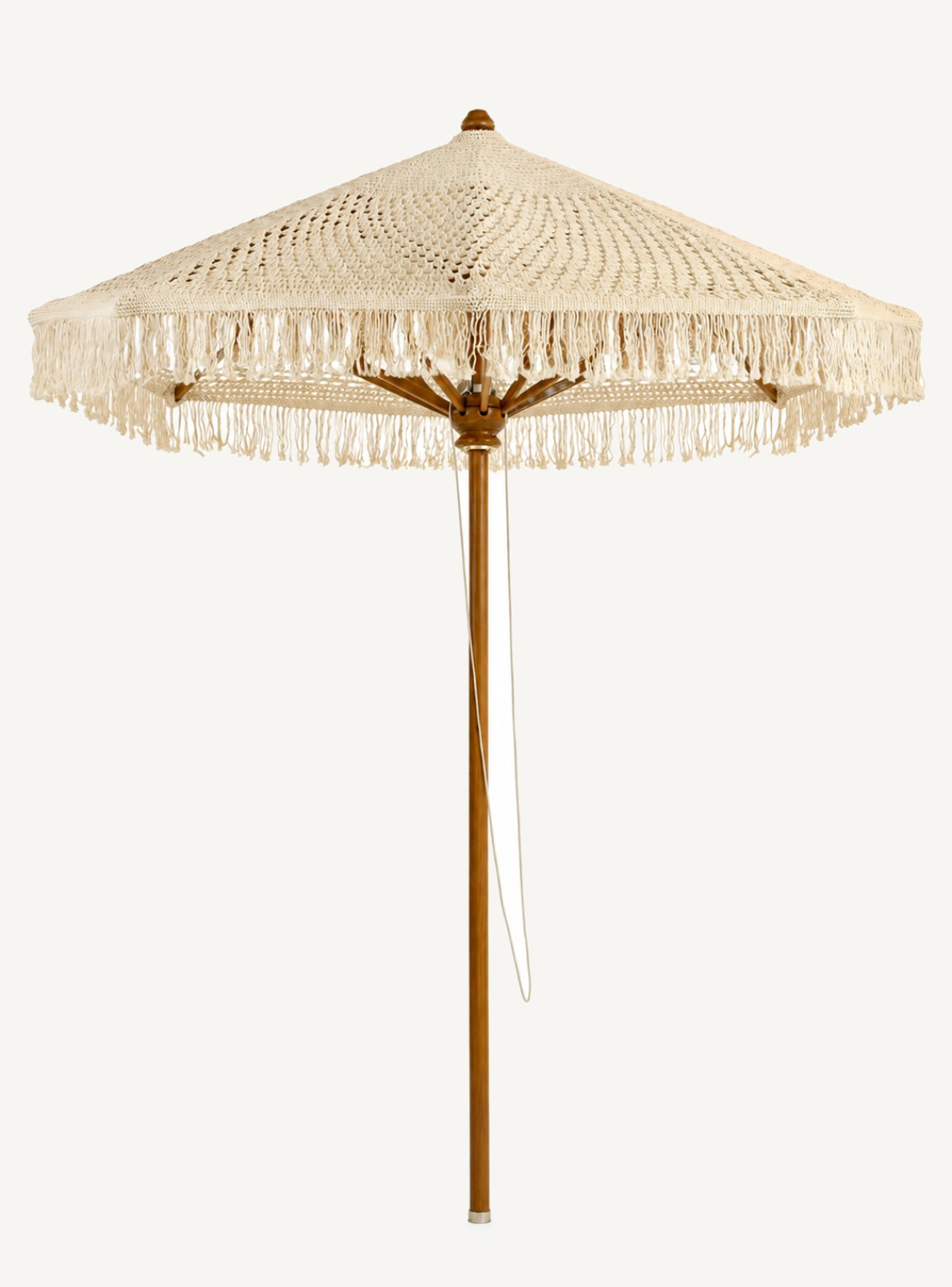 Soleil Macrame Umbrella in White Cloud on warm off-white background