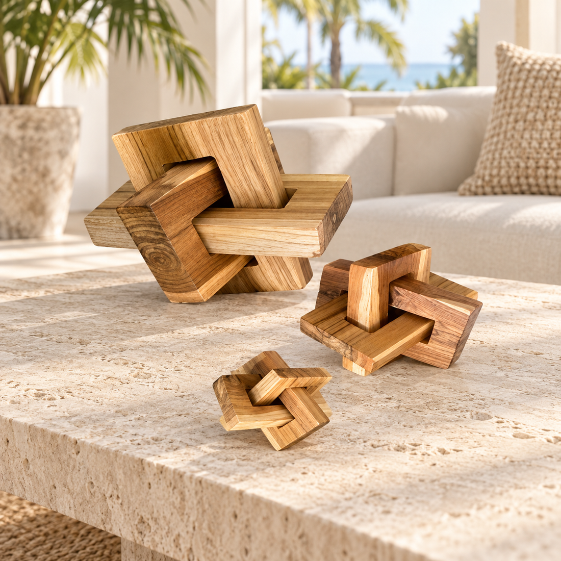 Square Teak Link Sculpture in three sizes on warm off-white background