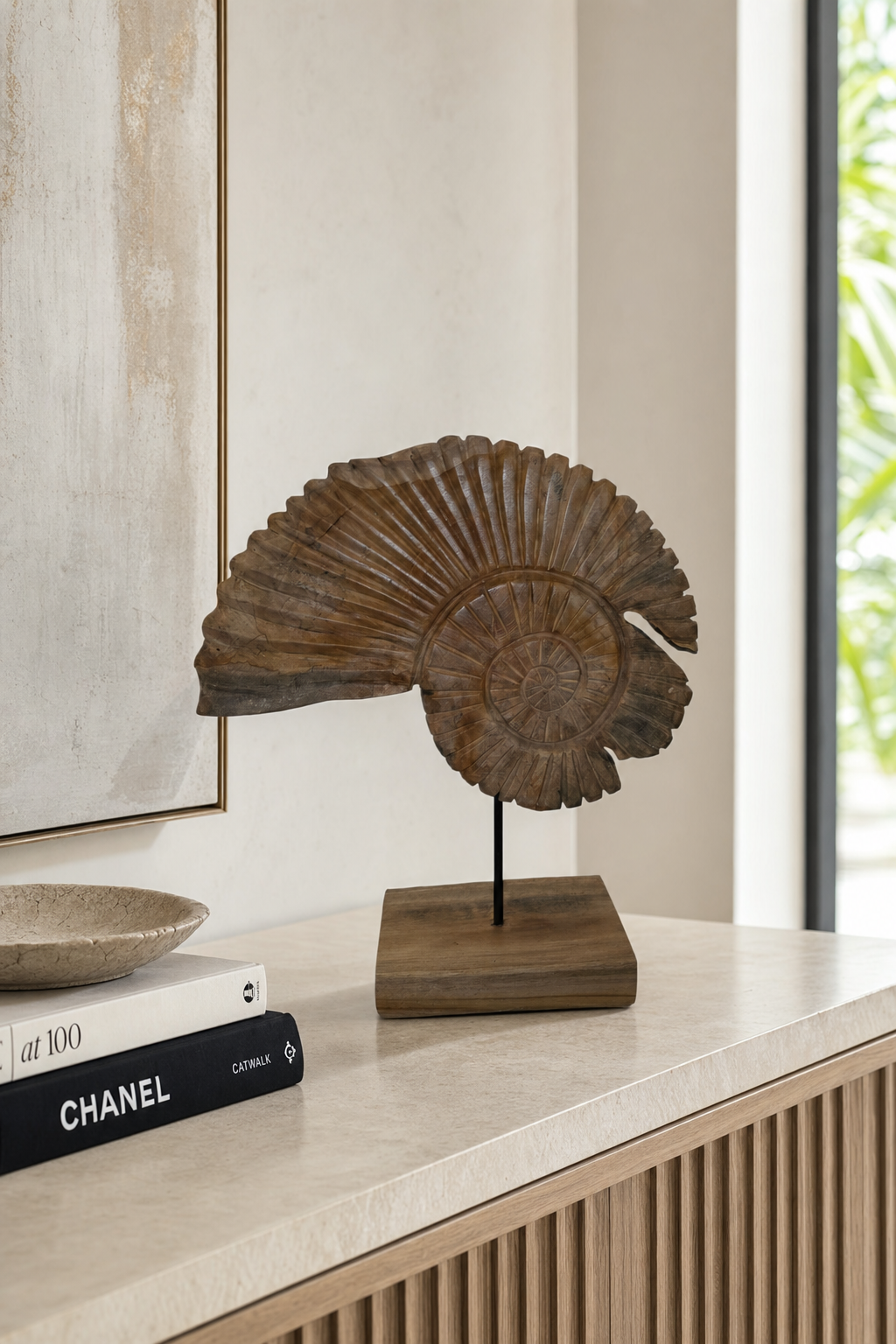 Teak Shell Pedestal Sculpture styled in an interior