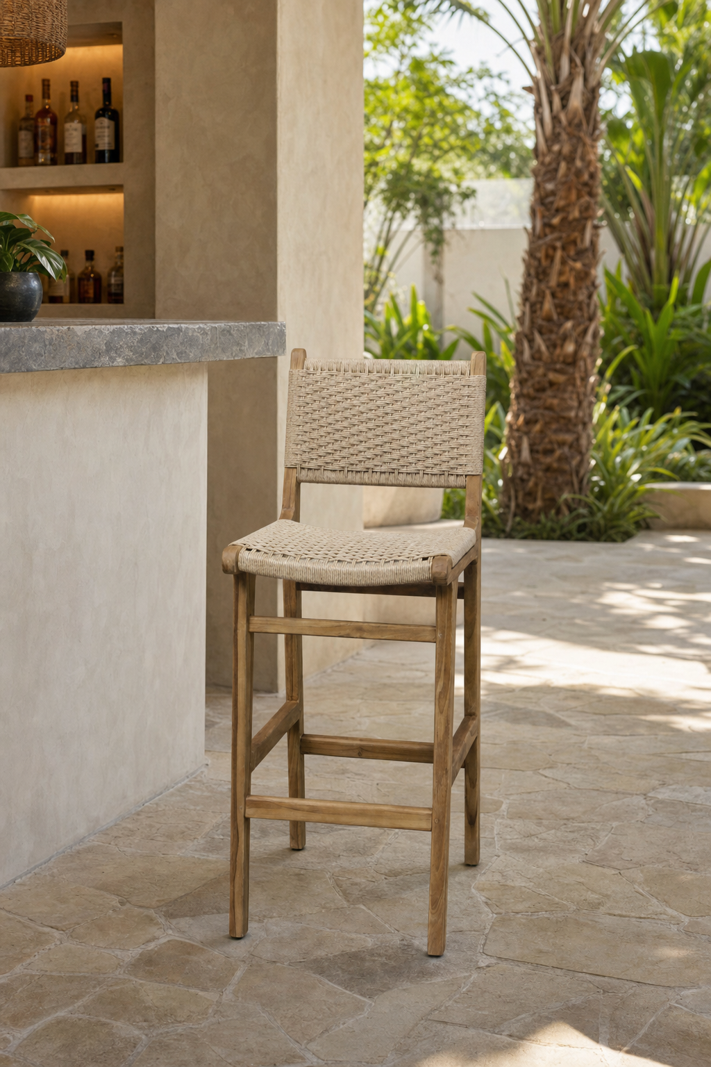 Viro Rope Bar Chair at a shaded outdoor bar in Miami