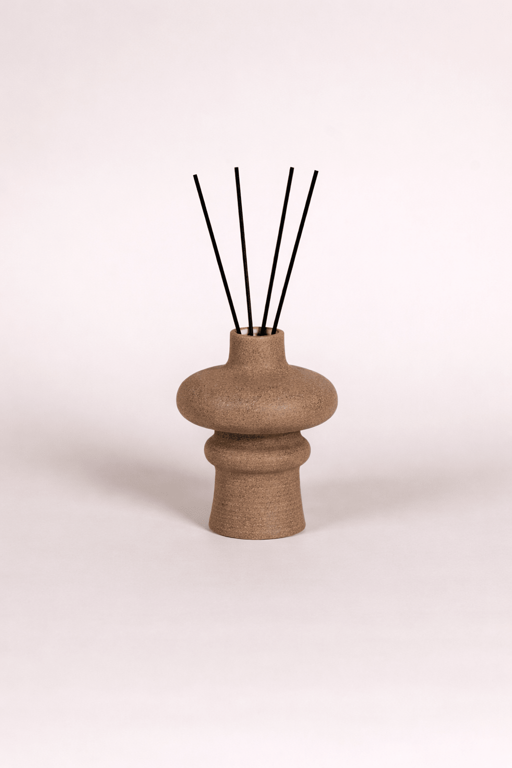 Wave Reed Diffusers styled on a bathroom vanity