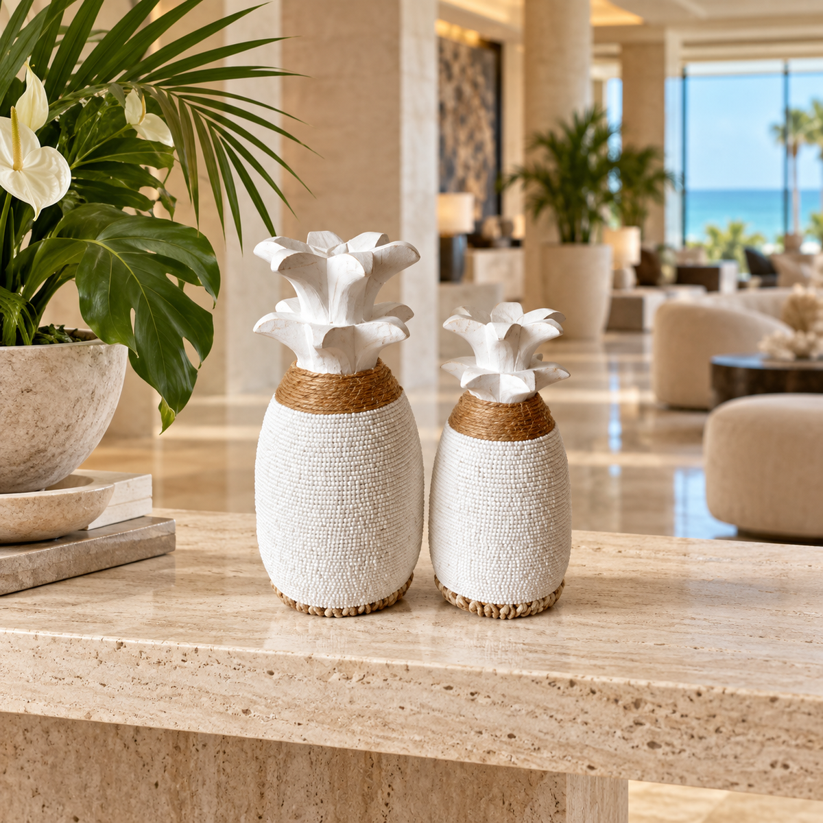 White beaded pineapple sculptures in a luxury Miami hotel lobby