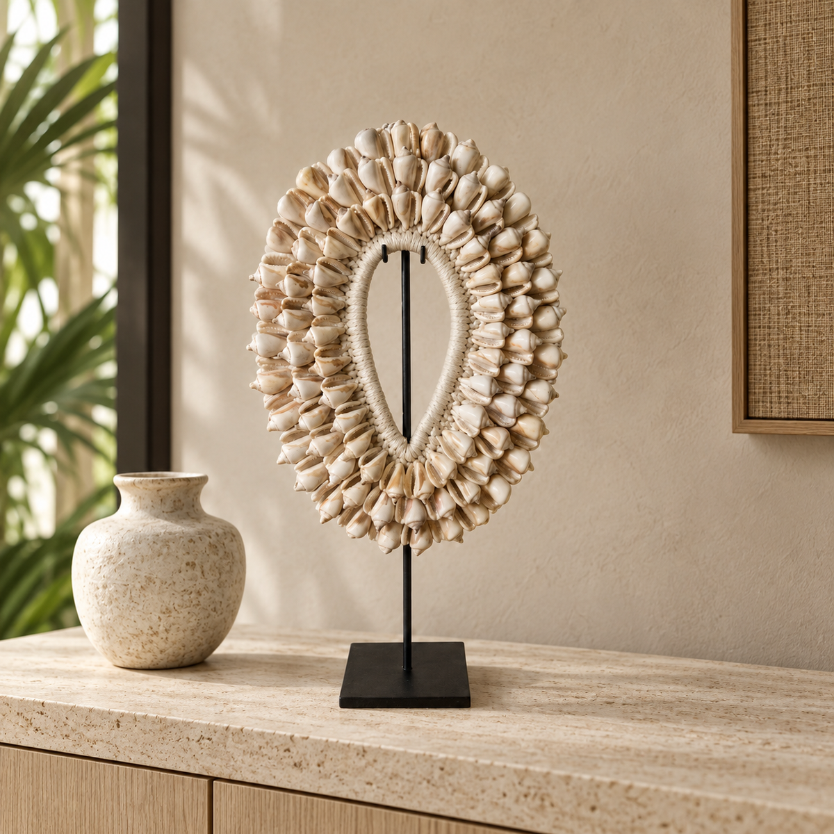 White Cowrie Shell Ring Necklace on Metal Stand, styled interior