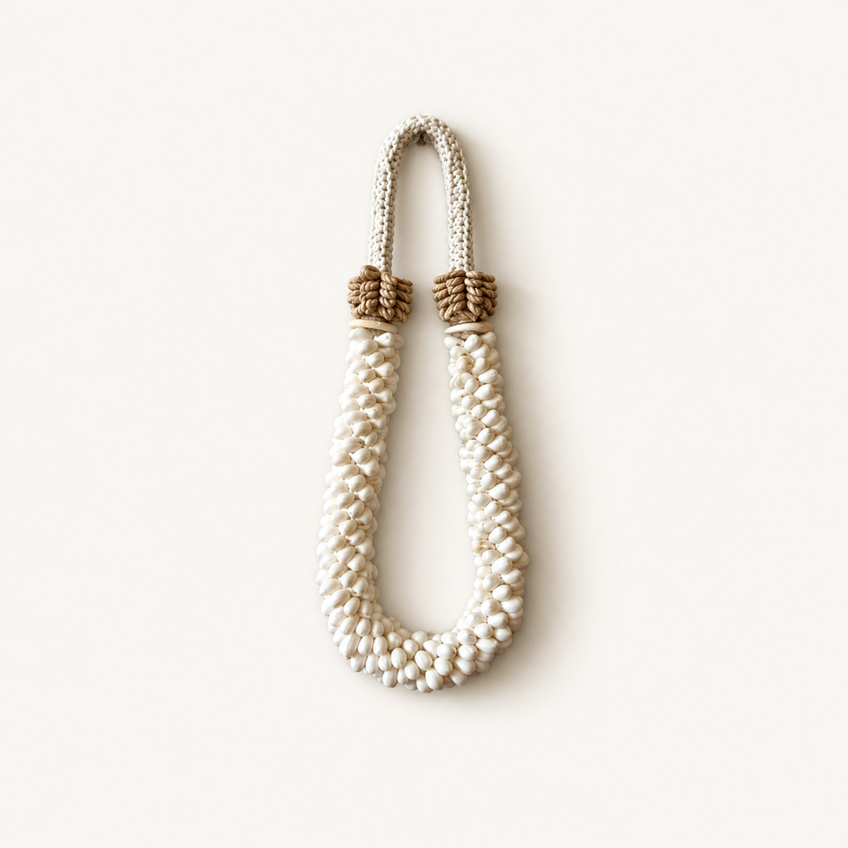 White Double Strand Shell Necklace on Metal Stand, front catalog view
