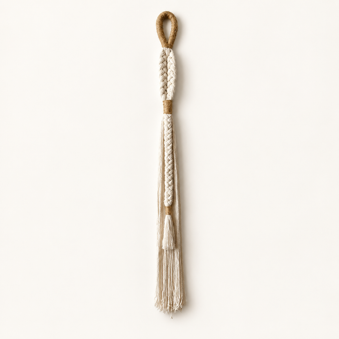 White Shell and Cotton Wall Hanging on warm cream background
